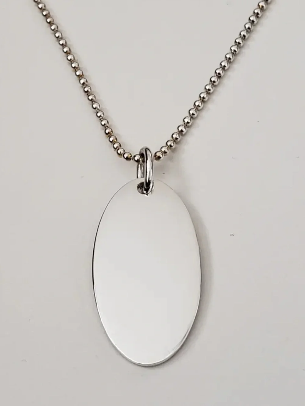 Gucci Sterling Silver Oval Engraved Pendant Necklace